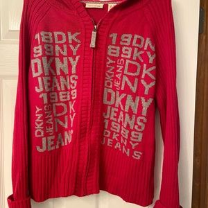 Like new woman’s long sleeved red zipper hooded DKNY sweater. XL